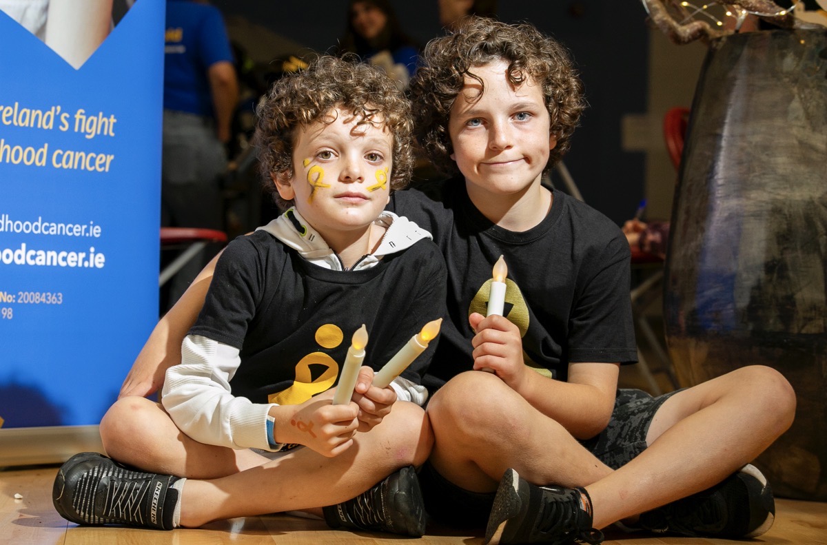 *****NO FEE PIC***
24/09/2023
Oisín Gorman 8 & Andrew Gorman 11 from Maynooth
during the Light it up Gold Walk in Maynooth, Co. Kildare.
The candlelit walk brought families and the community together in solidarity, to shine a light on living with and beyond childhood cancer.
The event took place in St. Patrick’s College Maynooth & St. Mary's Boys' National School marking the 10th anniversary of the first walk in Dublin in 2013.
PHOTO: Gareth Chaney/Collins