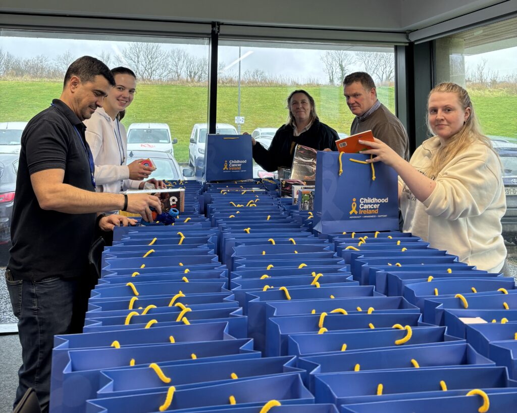 Photo of a company's staff packing goodie bags