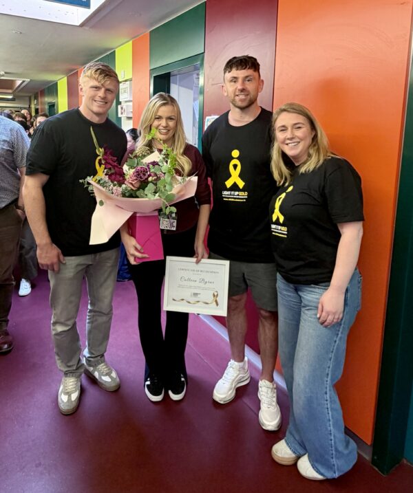 Colleen receiving her award