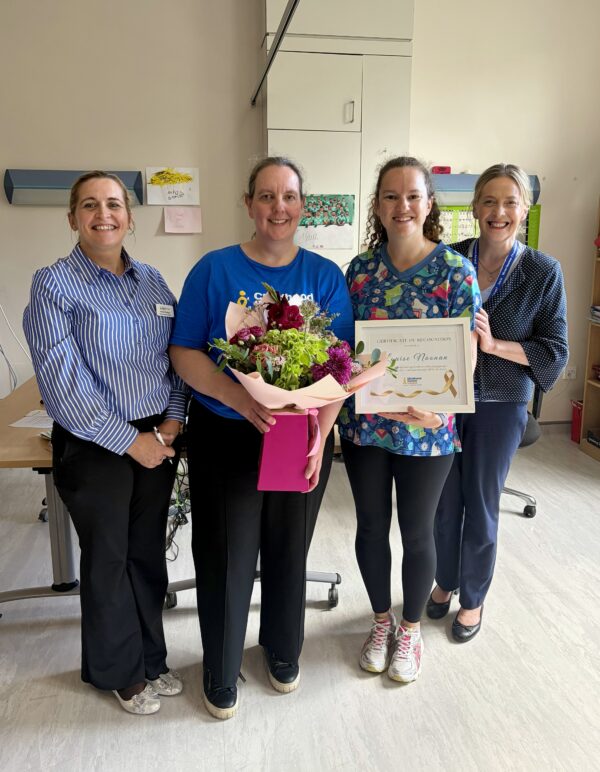 Louise receiving her award