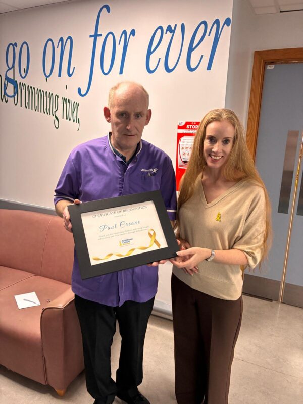Mairead Brennan presenting Paul Creane with his award