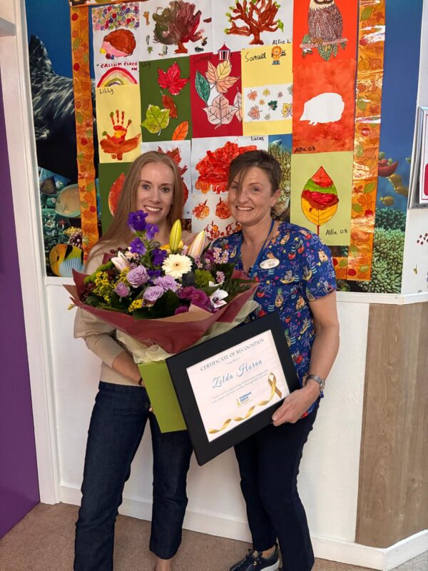 Mairead Brennan presenting Zelda Horan with her award